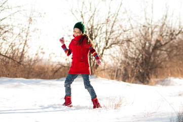 Fototapeta premium winter walk, sports, health, dancing in the snow
