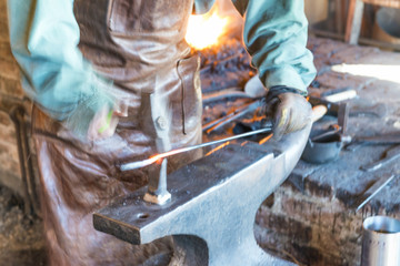Blur Sparks of Industrial welding. Man worker grinding iron and welding steel structure, workshop environment