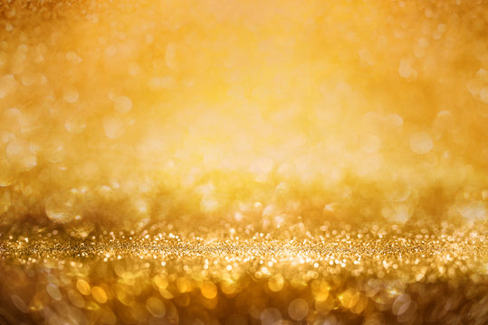 Fototapeta Abstract golden glitter bokeh background