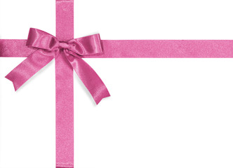 Pink bow satin ribbon isolated on white background with clipping path for gift box wrap and holiday...