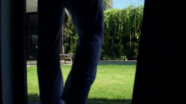 Man walking outside and relaxing, steadycam shot, slow motion shot at 240fps
