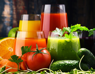 Glasses with fresh organic vegetable and fruit juices