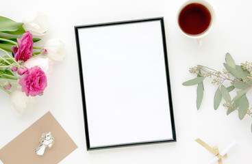 Styled scene with black frame, pink, white flowers, feminine flatlay, for mock-up