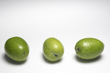Freshly harvested olives on white background from Sicily