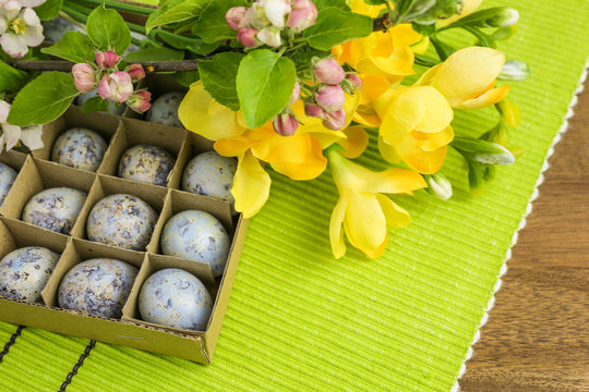 Quails Eggs On Green Place Mat