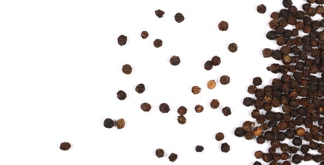 Black pepper isolated on white background, top view
