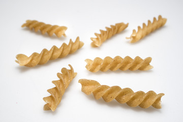 wholewheat pasta propeller on a white background