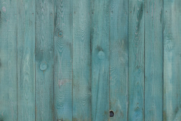 Turquoise wooden background, wood texture. Colored wood planks for display