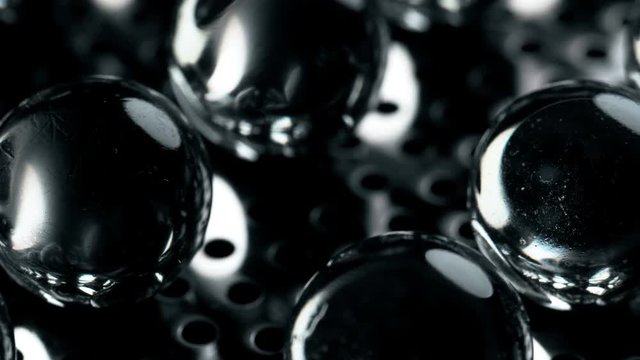 rows of glass balls,the camera is in motion