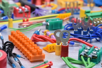 Components and accessories for use in electrical installations