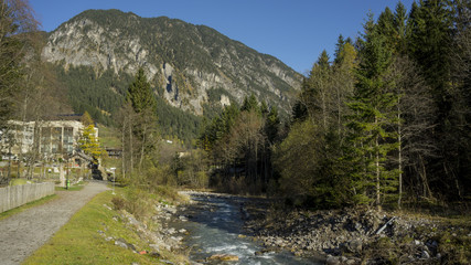 Spring river with alps