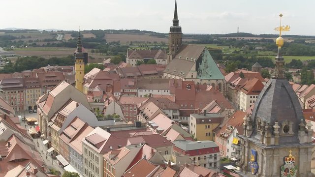Aerial Drone flying over red roofs tiles in Bautzen old village city in Germany Saxony 4k