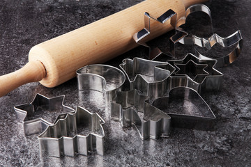 baking and kitchen tool utensil rolling pin and christmas cutters.