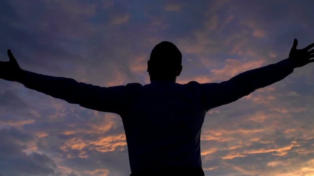 Man looks joyful and feels free, steadycam shot, slow motion shot at 240fps
