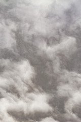Vertical view  of overcast texture with clouds. Copy space.A lot of clouds in dramatic filter.