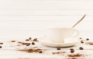 Ceramic coffee cup on white wood copy space