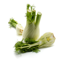 Florence fennel isolated on white background one whole bulb and cut in half.