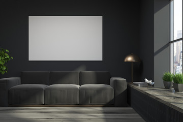 Black loft living room, gray sofa, poster