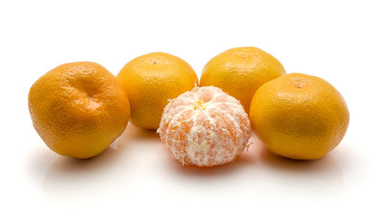 Five tangerines isolated on white background one peeled.