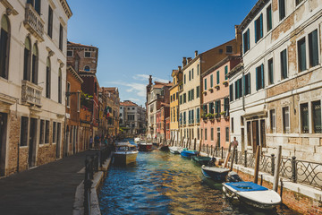 Fototapeta na wymiar Venice cityscape, narrow water canal, bridge and traditional buildings. Italy