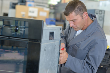 oven technician doing his work