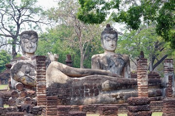 Buddha statue, ancient sculptures  of Buddha in ruins of Wat Phra Kaew. Kamphaeng Phet, Thailand