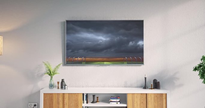 Footage of a living room led tv on white wall showing 3D rendered sports stadium.