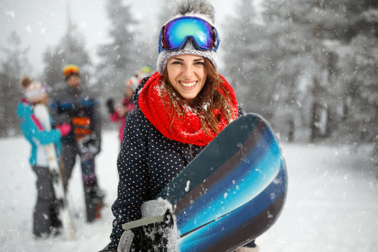 portrait of young girl snowboarder