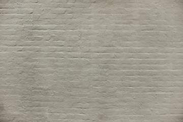 Old grey brick wall background texture