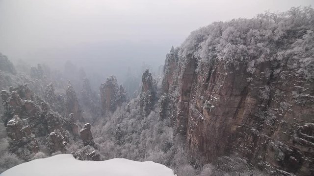 winter time chinese mountain park zhangjiajie full hd snowy panorama china
