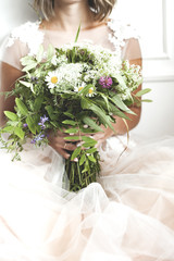 beautiful wedding bouquet of wild flowers