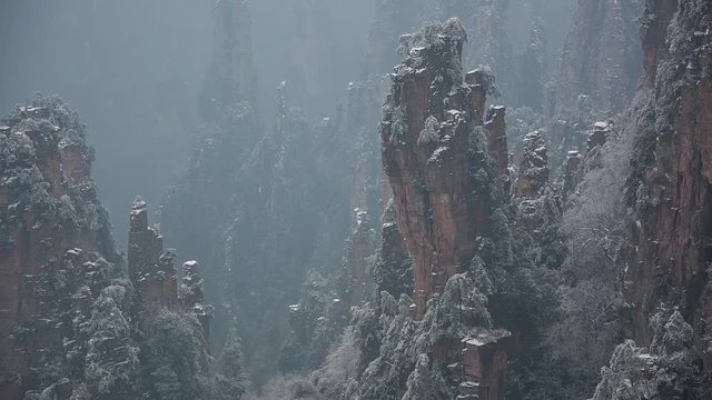winter time chinese mountain park zhangjiajie full hd snowy panorama china
