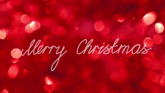 Handwritten text "Merry Christmas" against red bokeh glittering background