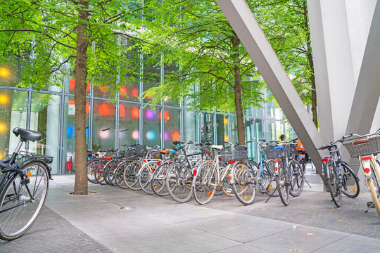 landscape,architectural structure, bicycles parked together and  multi-color lights