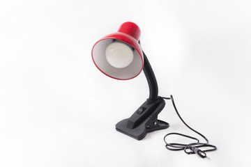 Red table lamp with flexible arm