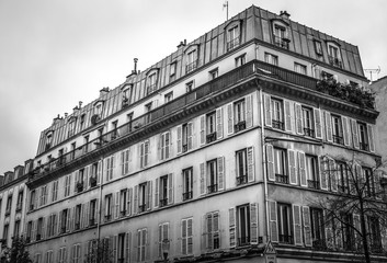 Traditional architecture of residential buildings. Black-white photo. Paris - France.