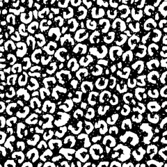 Seamless black and white grunge fashion leopard spots pattern vector
