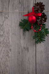 Christmas background of green branches of fir, pine cone and Christmas decorations.
