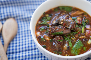 Thai sour and spicy sardines in tomato sauce salad.