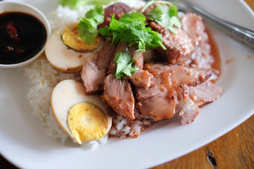 Barbecued red pork in sauce with rice