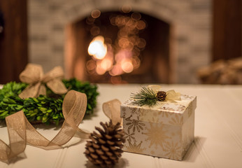 Getting ready for Christmas wrapping gifts by the fire