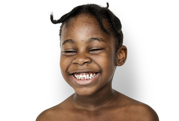 African kid portrait shoot with smiling expression © Rawpixel.com