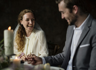 Couple at the wedding day reception table