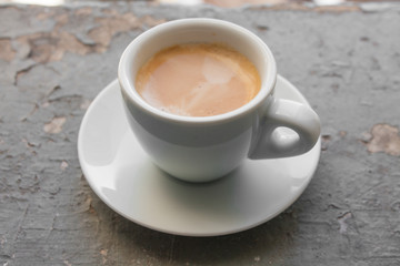 Cup of coffee espresso, top view on grey grunge background
