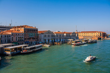 Fototapeta na wymiar Venice City of Italy. View on Grand Canal, Venetian Landscape with boats and gondolas and ferrys