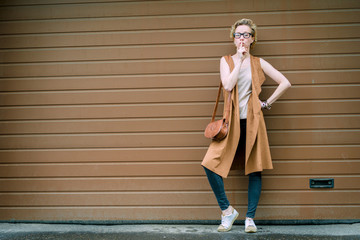 woman on a brown wall background