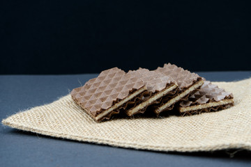 brown waffles on a black background