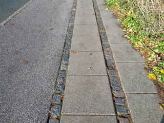 sidewalk made from block bricks and titles