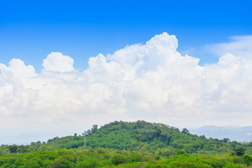 Fototapeta na wymiar Mountain green range in clouds landscape. Mountain sky