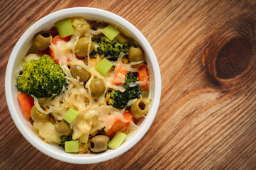 Casserole with vegetbales and cheese.